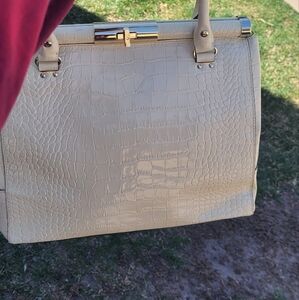 Kate Spade trun lock purse